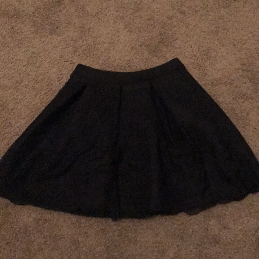 Lace pleated scuba skater skirt.